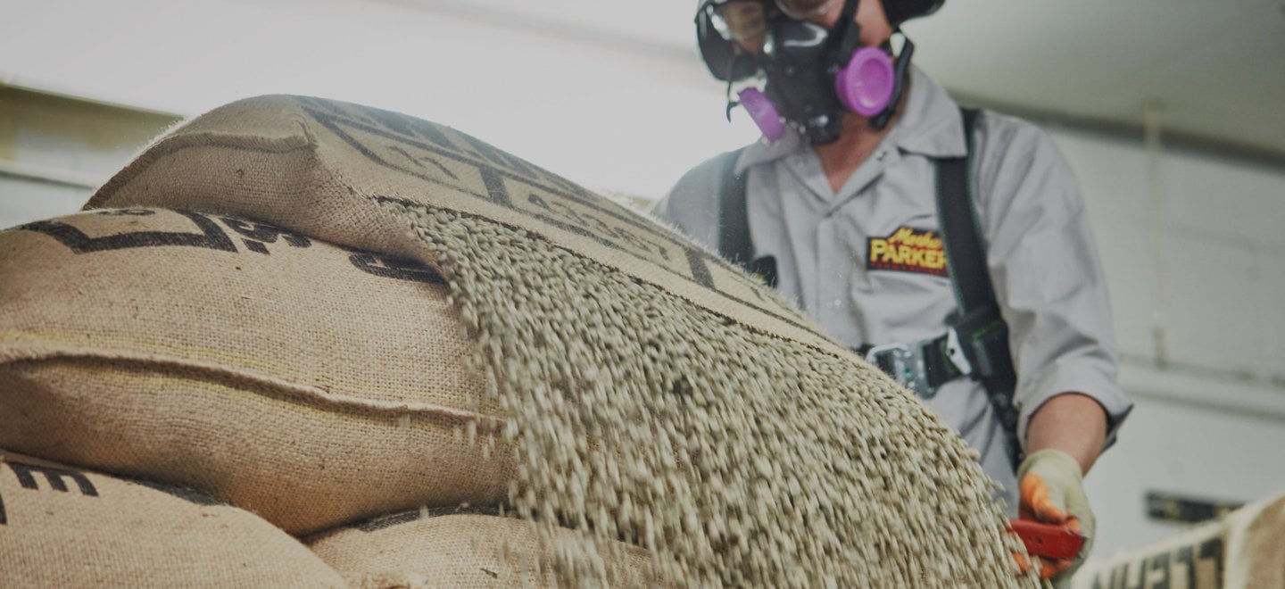 Assembly line of workers packaging up the products