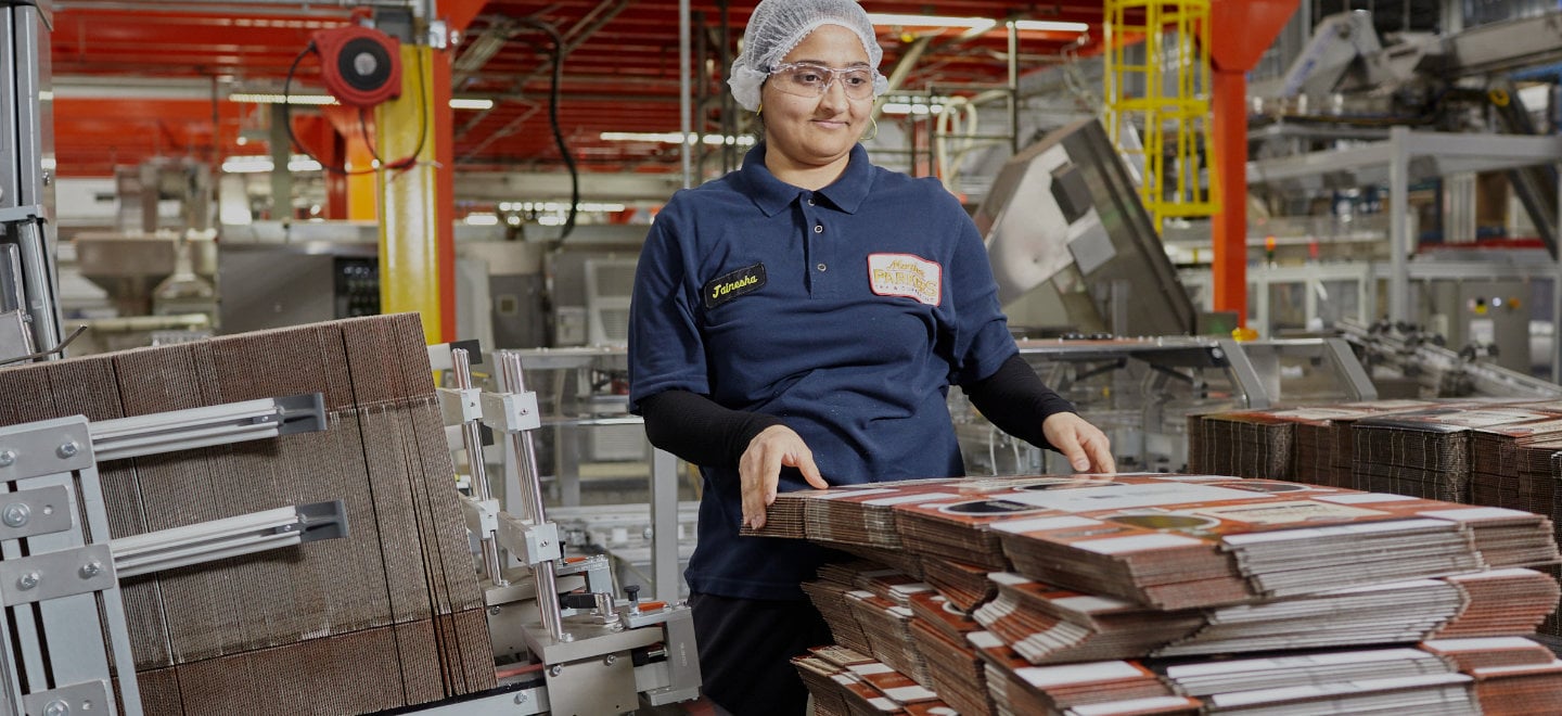 A worker in the Mother Parkers' factory